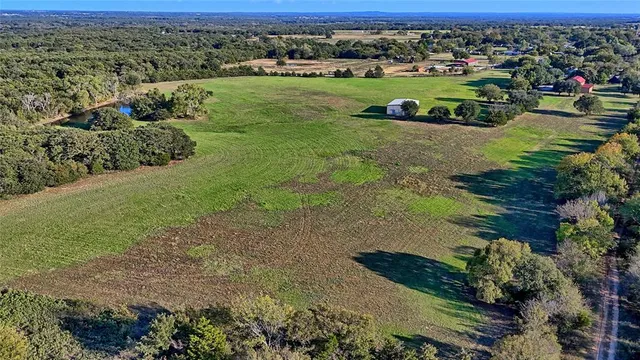 a view of a lake from a yard