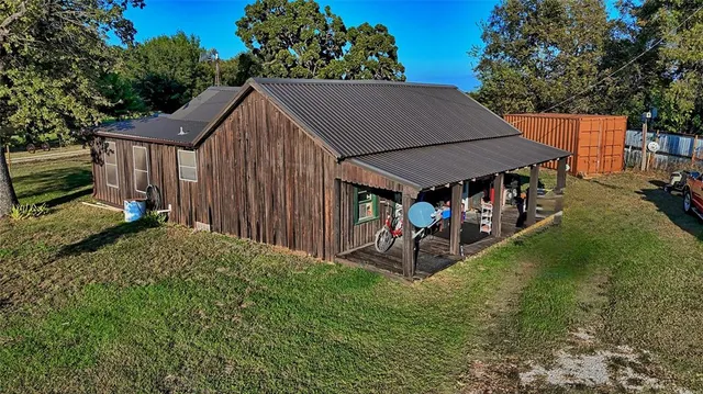 a view of a yard with an outdoor space