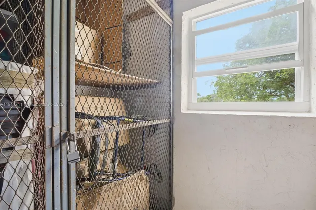 a view of a door and a window