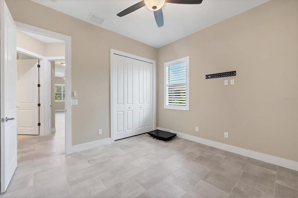 249 Rotonda Circle Rotonda West, FL 33947 - Photo 28 of 71 a view of an empty room with a window