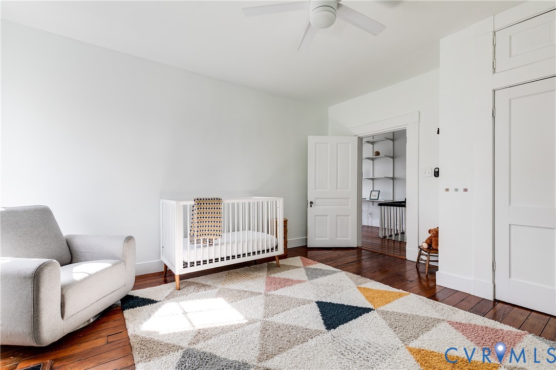 307 North 31st Street Richmond, VA 23223 - Photo 31 of 45 a living room with furniture and a rug