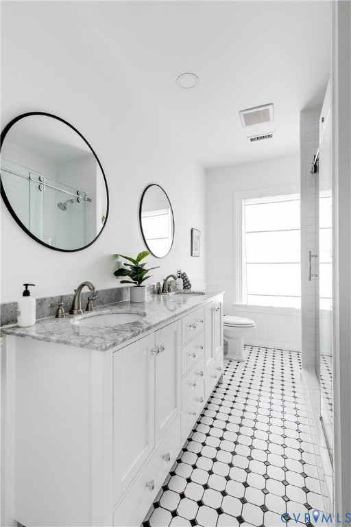 307 North 31st Street Richmond, VA 23223 - Photo 34 of 45 a bathroom with a sink vanity granite and a mirror