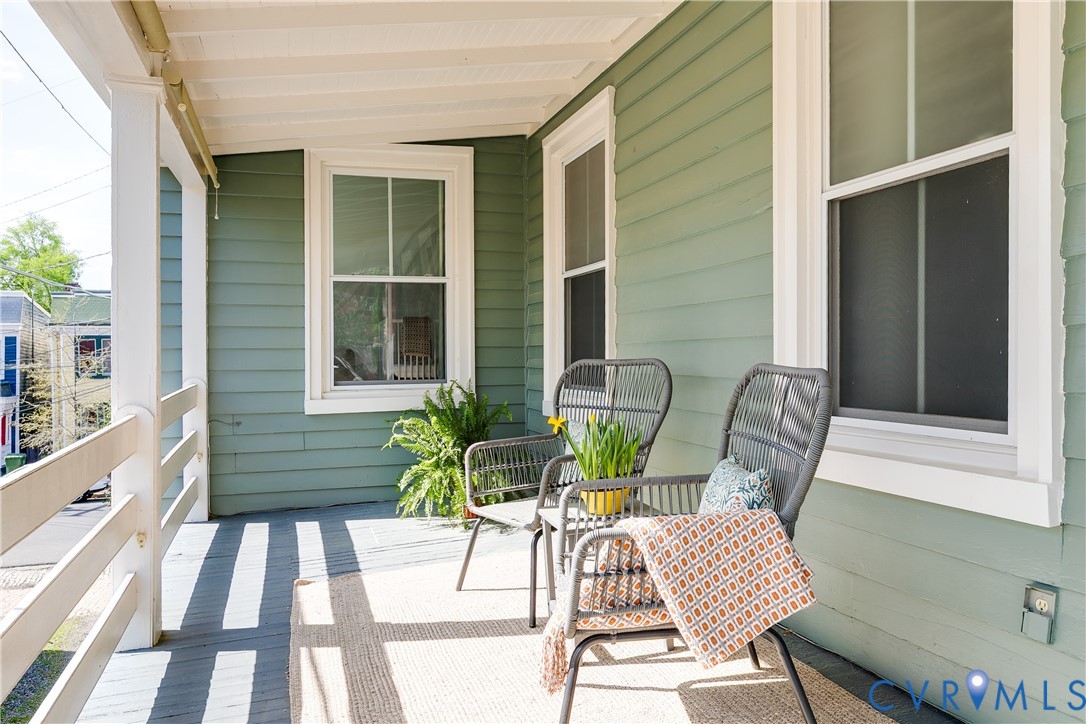 307 North 31st Street Richmond, VA 23223 - Photo 38 of 45 a view of backyard with outdoor seating and a potted plant