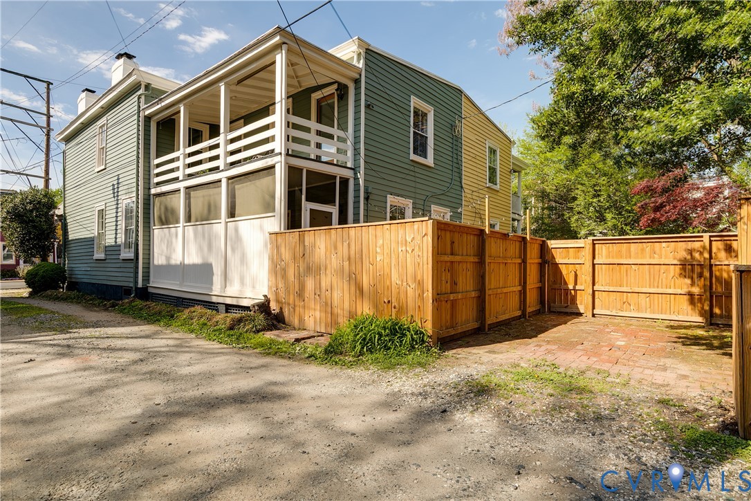 307 North 31st Street Richmond, VA 23223 - Photo 45 of 45 a view of a blue house with a large space in front of it