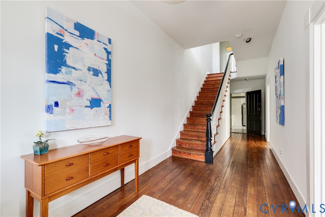 307 North 31st Street Richmond, VA 23223 - Photo 8 of 45 wooden floor in an empty room with a window
