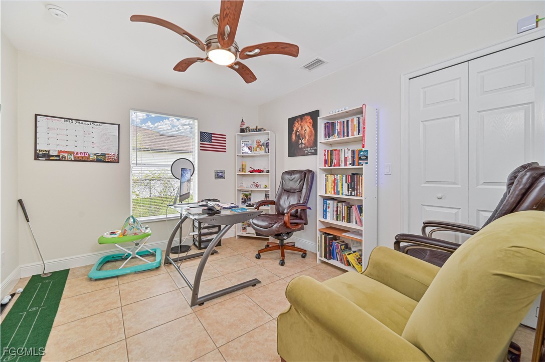 721-723 Homer Avenue South, Unit 723 Lehigh Acres, FL 33973 - Photo 15 of 36 a living room with furniture