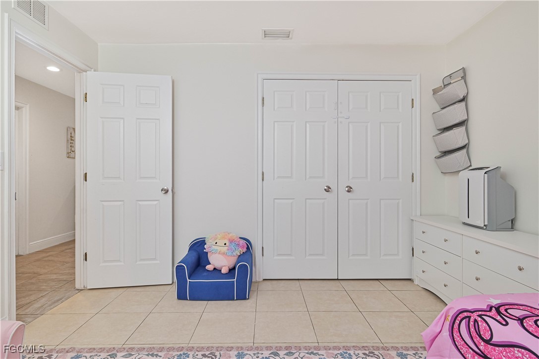 721-723 Homer Avenue South, Unit 723 Lehigh Acres, FL 33973 - Photo 19 of 36 a living room with furniture