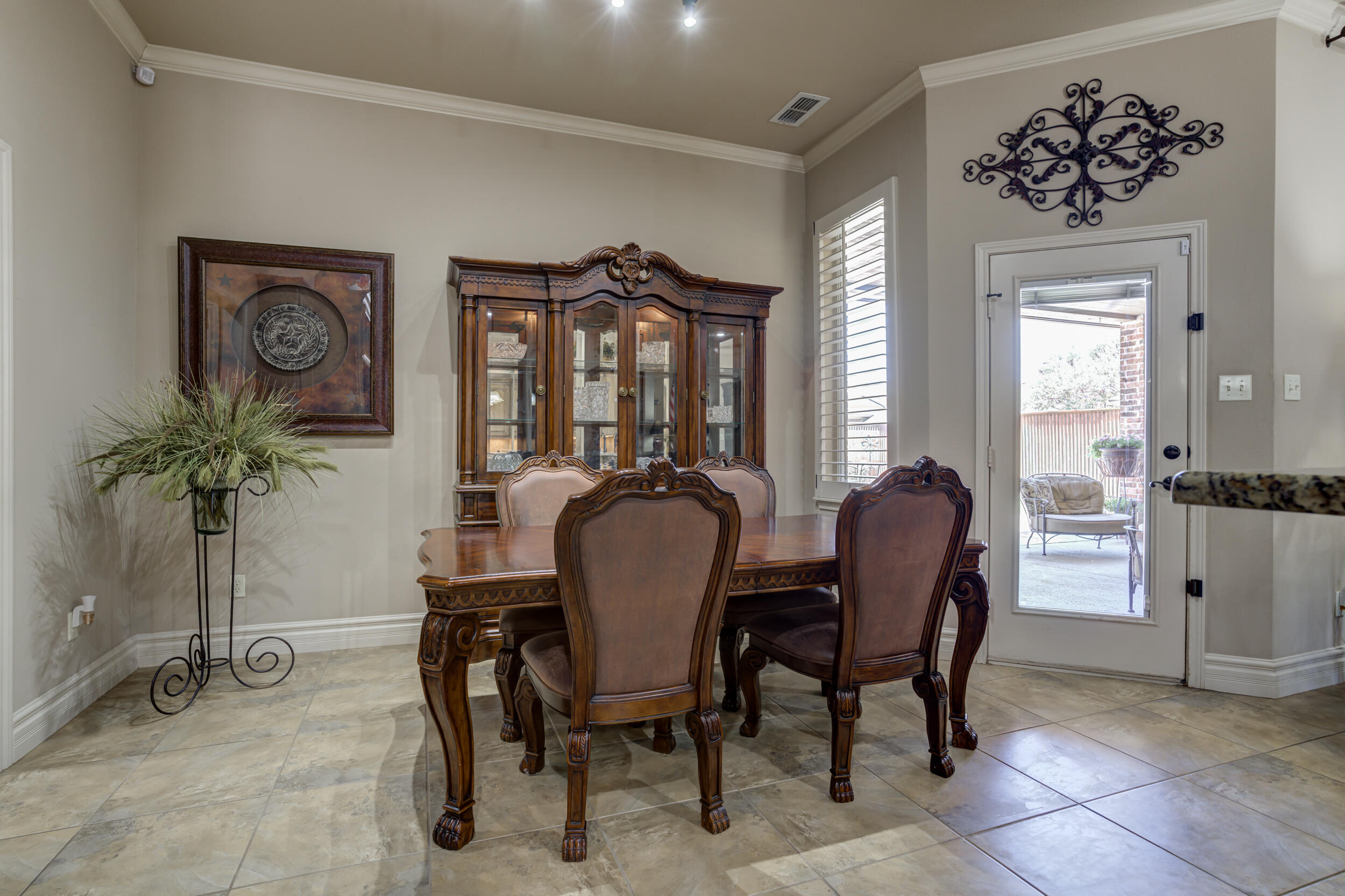 6008 89th Street Lubbock, TX 79424 - Photo 25 of 61 a dining room with furniture and window