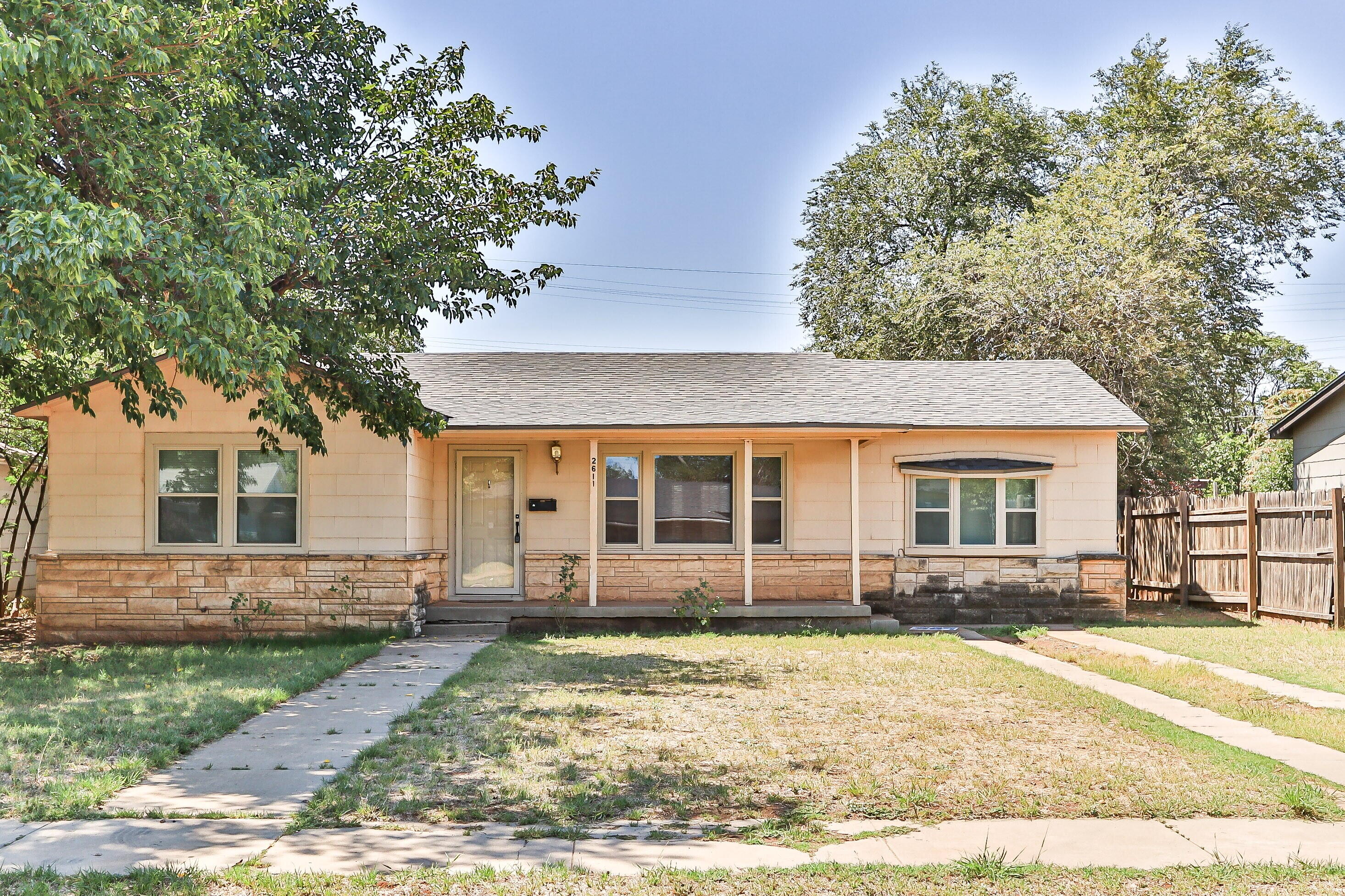 2611 44th Street Lubbock, TX 79413 - Photo 1 of 18 front view of a house