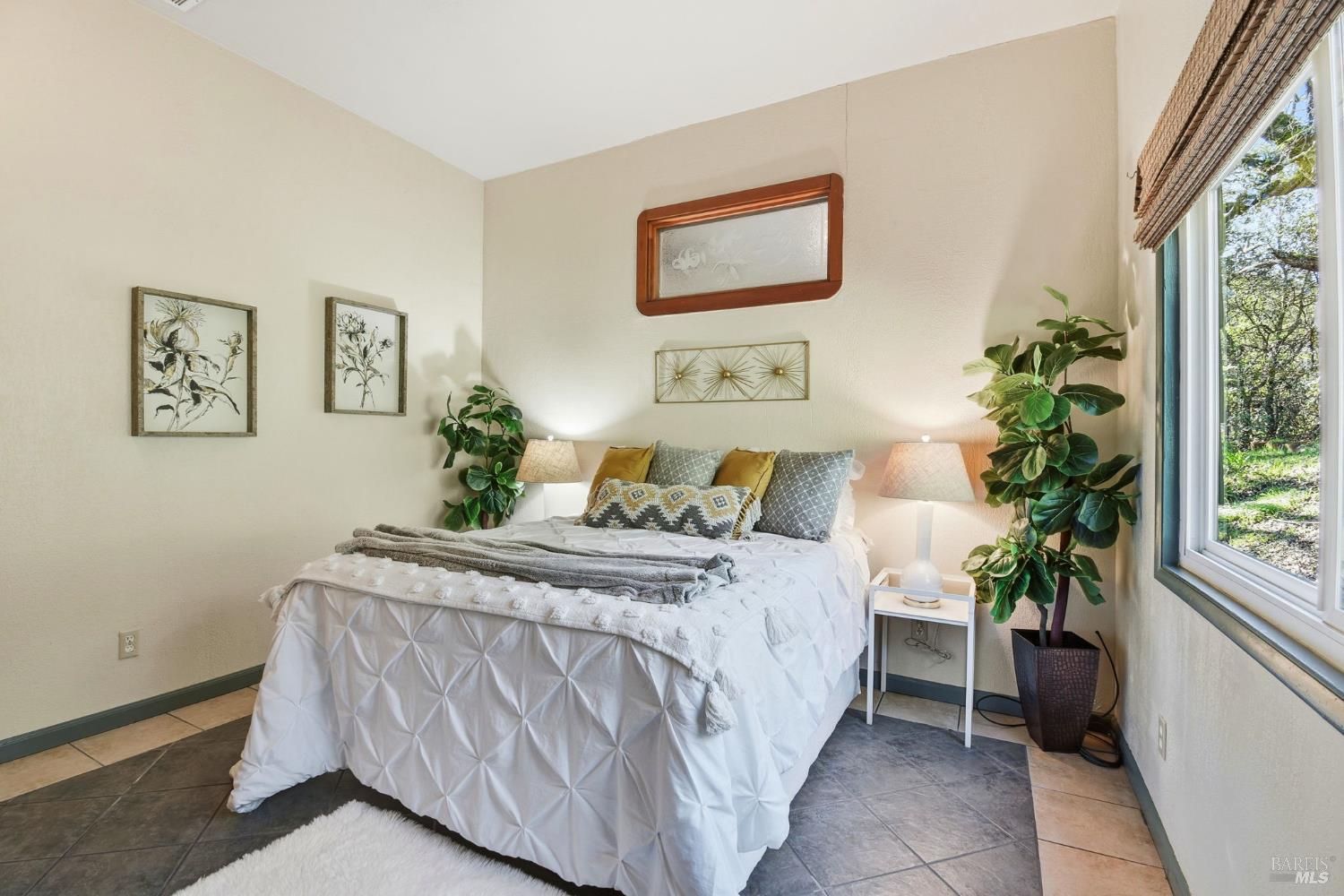 6825 Enterprise Road Glen Ellen, CA 95442 - Photo 25 of 51 a bedroom with bed and a potted plant