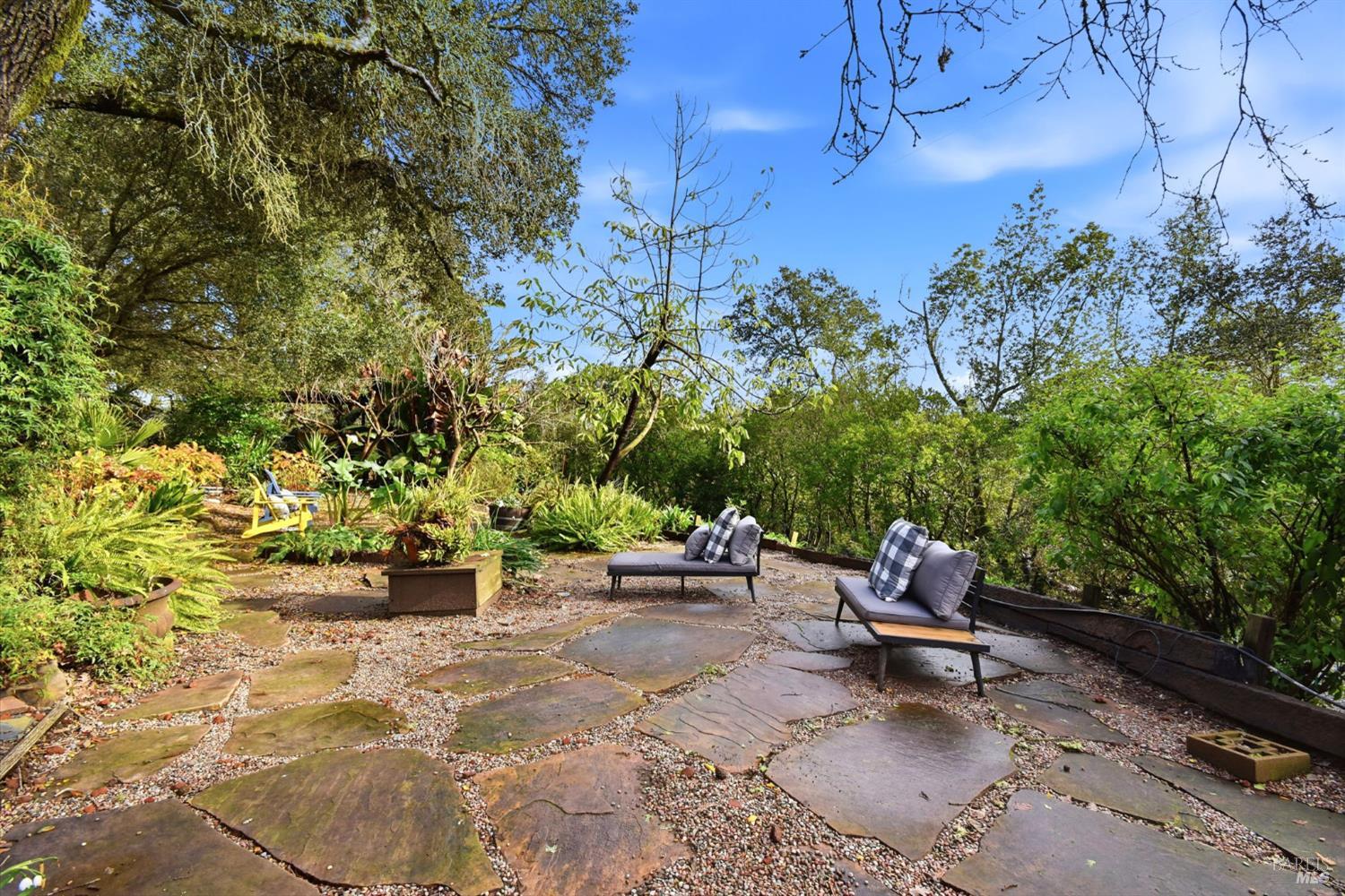 6825 Enterprise Road Glen Ellen, CA 95442 - Photo 35 of 51 a view of a backyard with sitting area