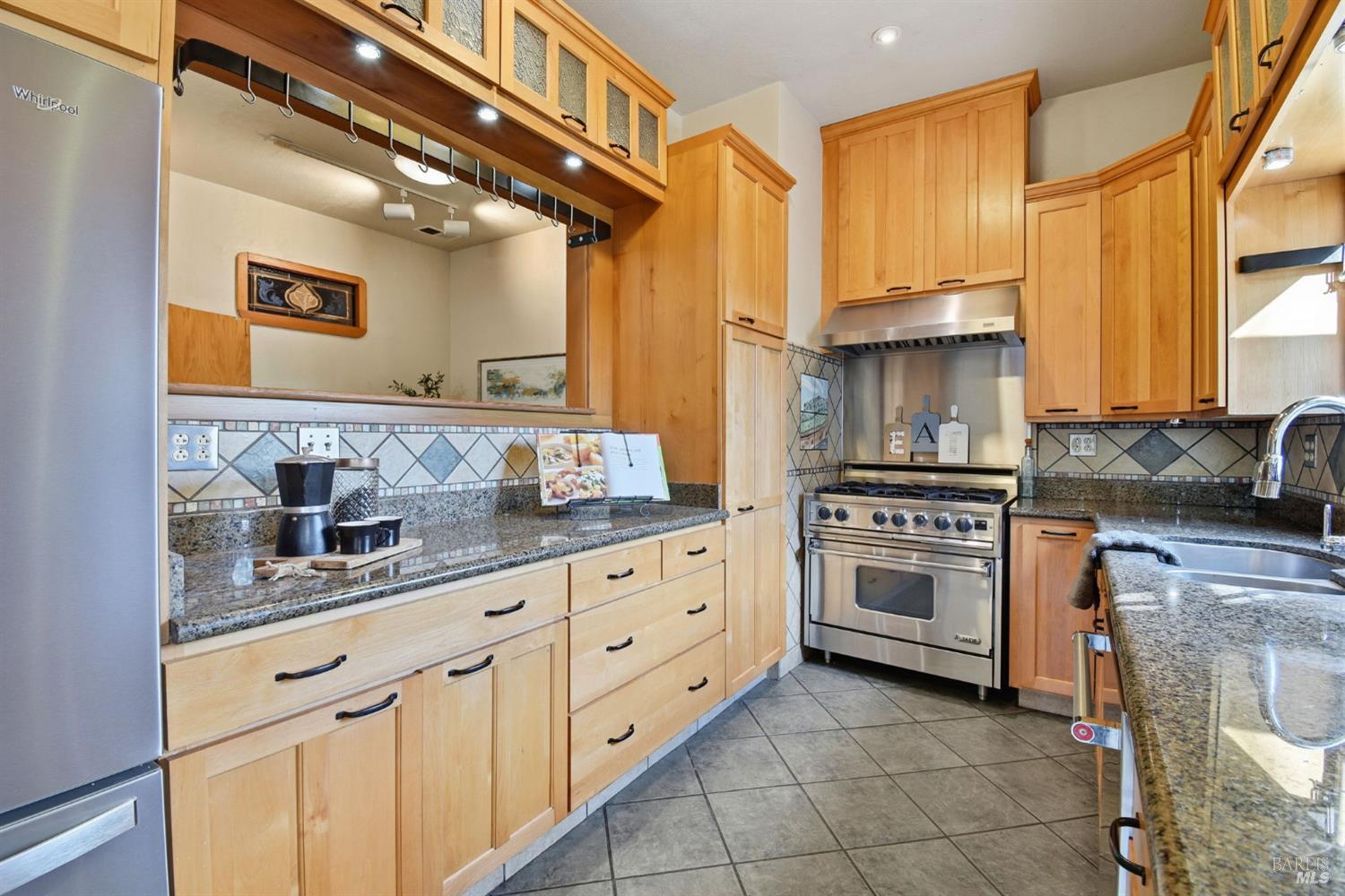 6825 Enterprise Road Glen Ellen, CA 95442 - Photo 10 of 51 a kitchen with granite countertop a sink stainless steel appliances and cabinets