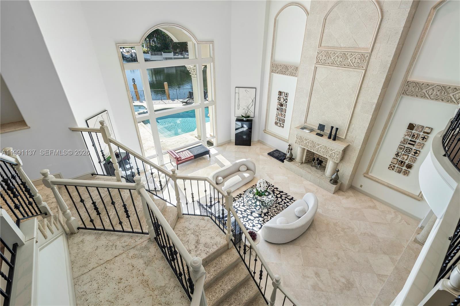 4900 Sanctuary Lane Boca Raton, FL 33431 - Photo 48 of 64 a living room with furniture and a wooden floor