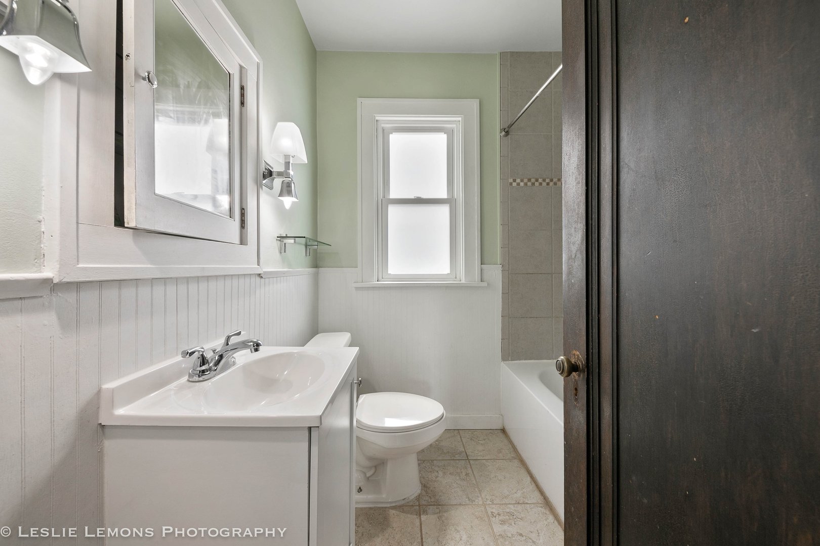 1106 Sycamore Road DeKalb, IL 60115 - Photo 14 of 30 a bathroom with a sink and a toilet