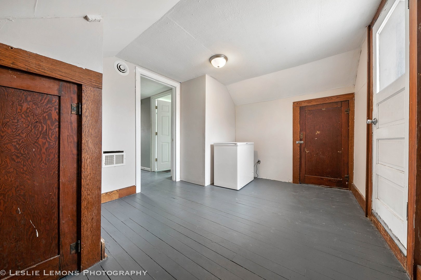 1106 Sycamore Road DeKalb, IL 60115 - Photo 15 of 30 wooden floor in an empty room and a gallery