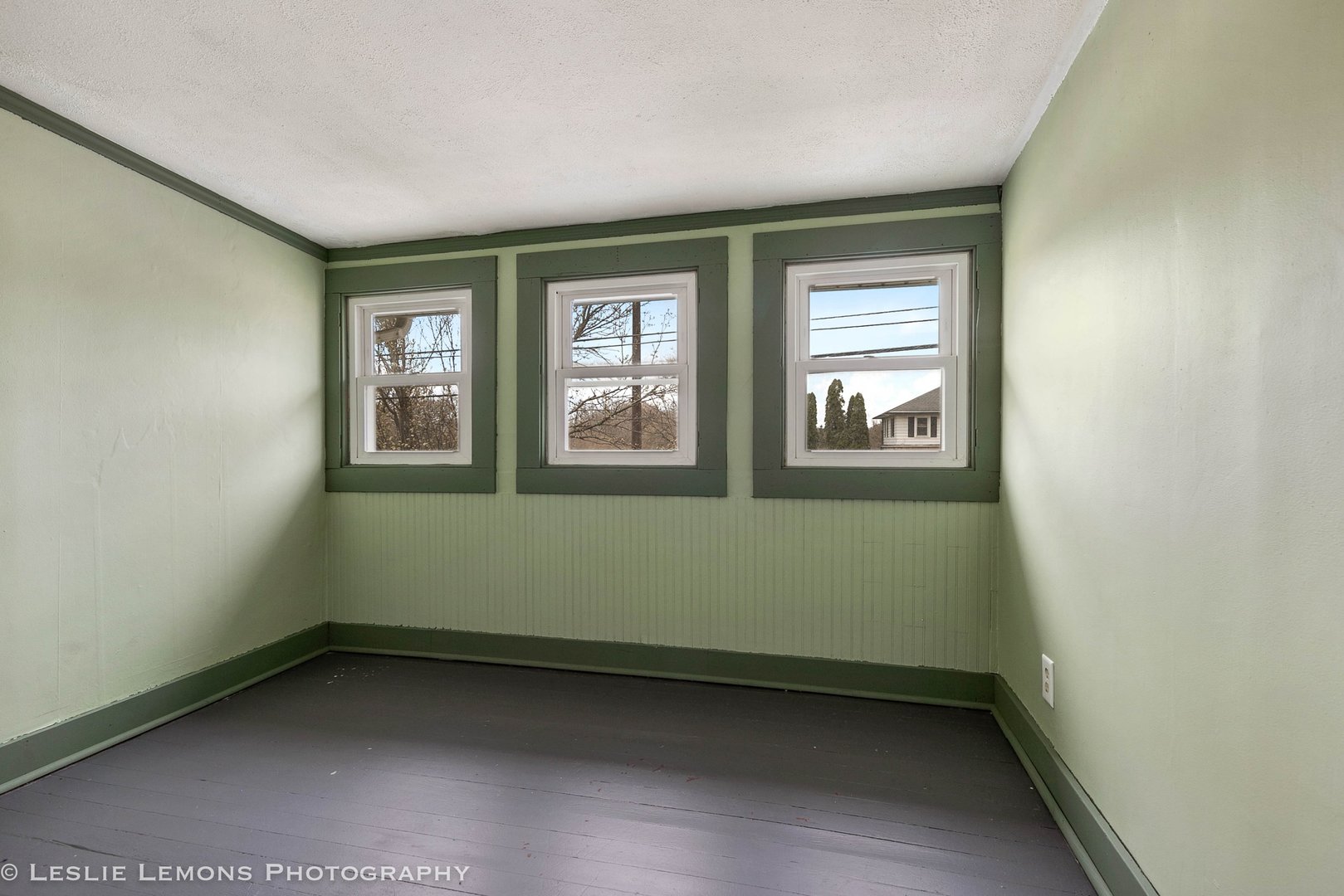 1106 Sycamore Road DeKalb, IL 60115 - Photo 20 of 30 a view of an empty room with a window