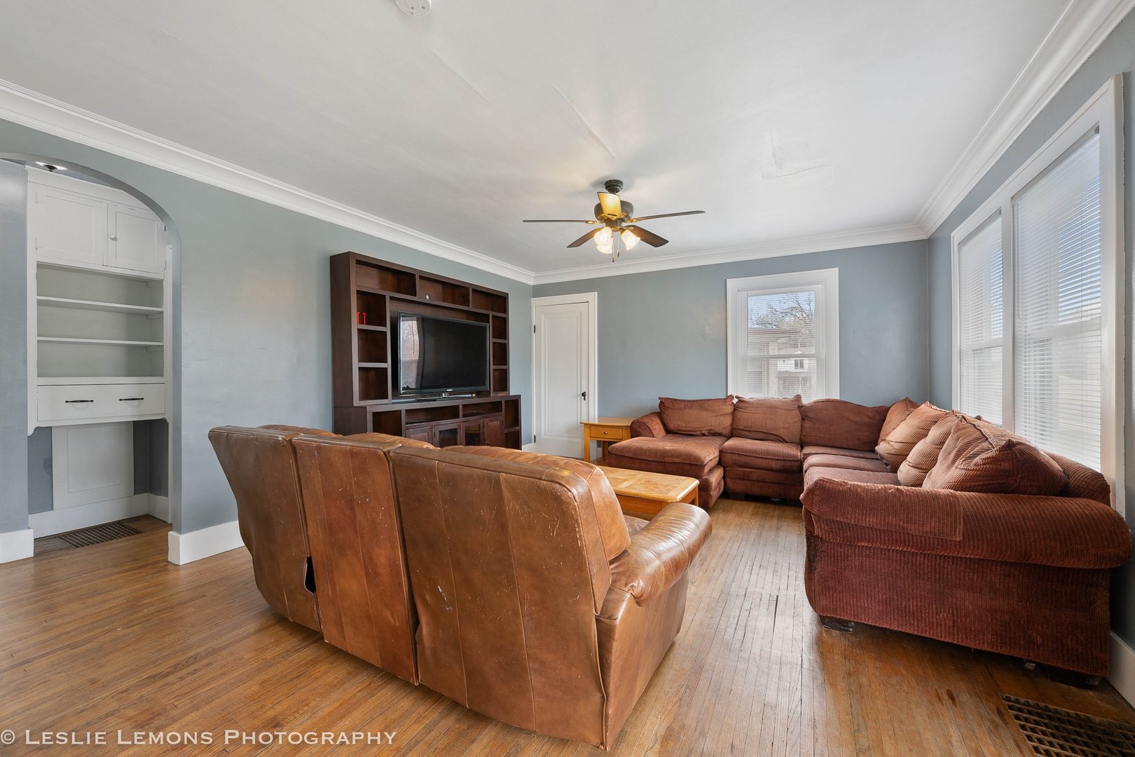 1106 Sycamore Road DeKalb, IL 60115 - Photo 2 of 30 a living room with furniture and a flat screen tv