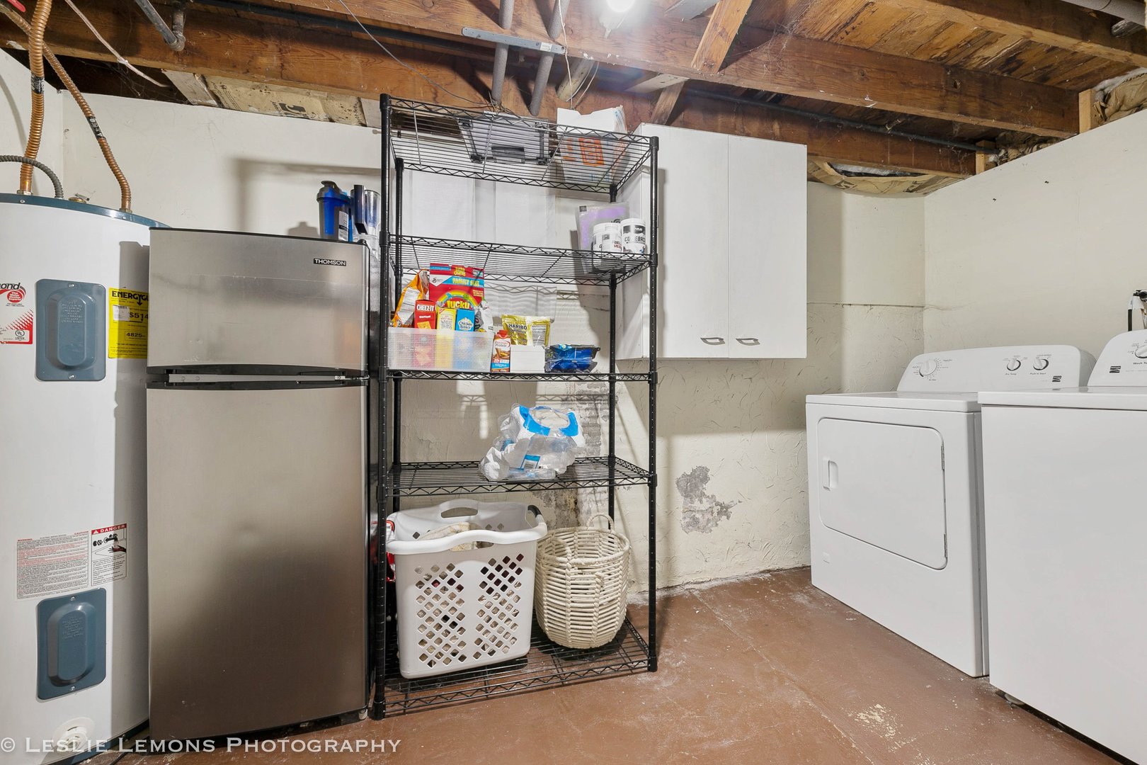 1106 Sycamore Road DeKalb, IL 60115 - Photo 23 of 30 a utility room with dryer and washer