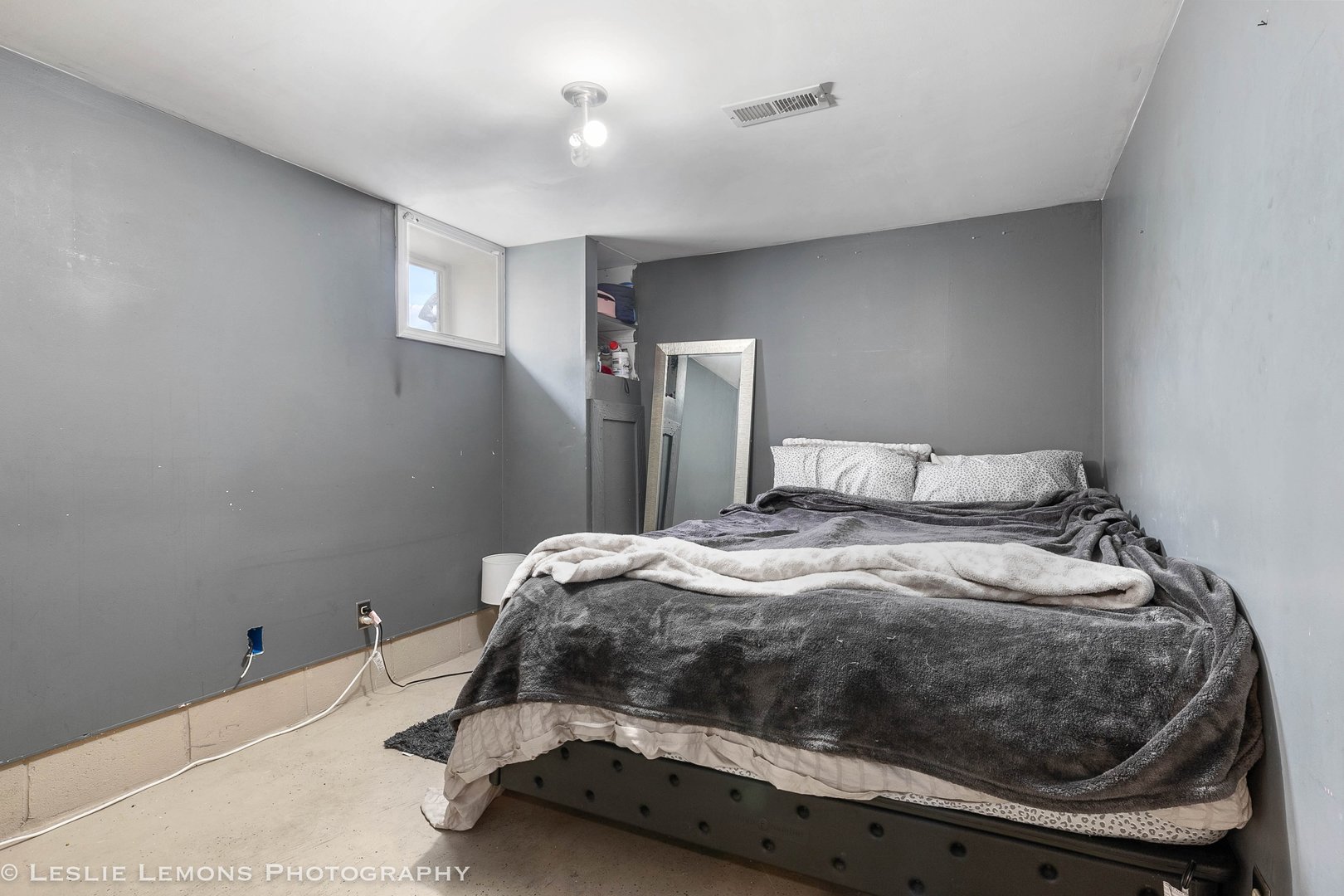 1106 Sycamore Road DeKalb, IL 60115 - Photo 25 of 30 a bedroom with a bed and window