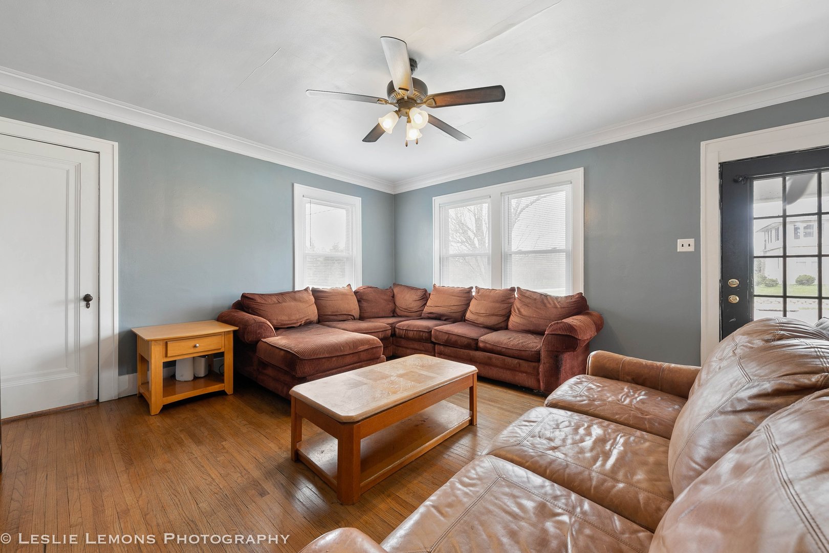 1106 Sycamore Road DeKalb, IL 60115 - Photo 3 of 30 a living room with furniture a ceiling fan and a window