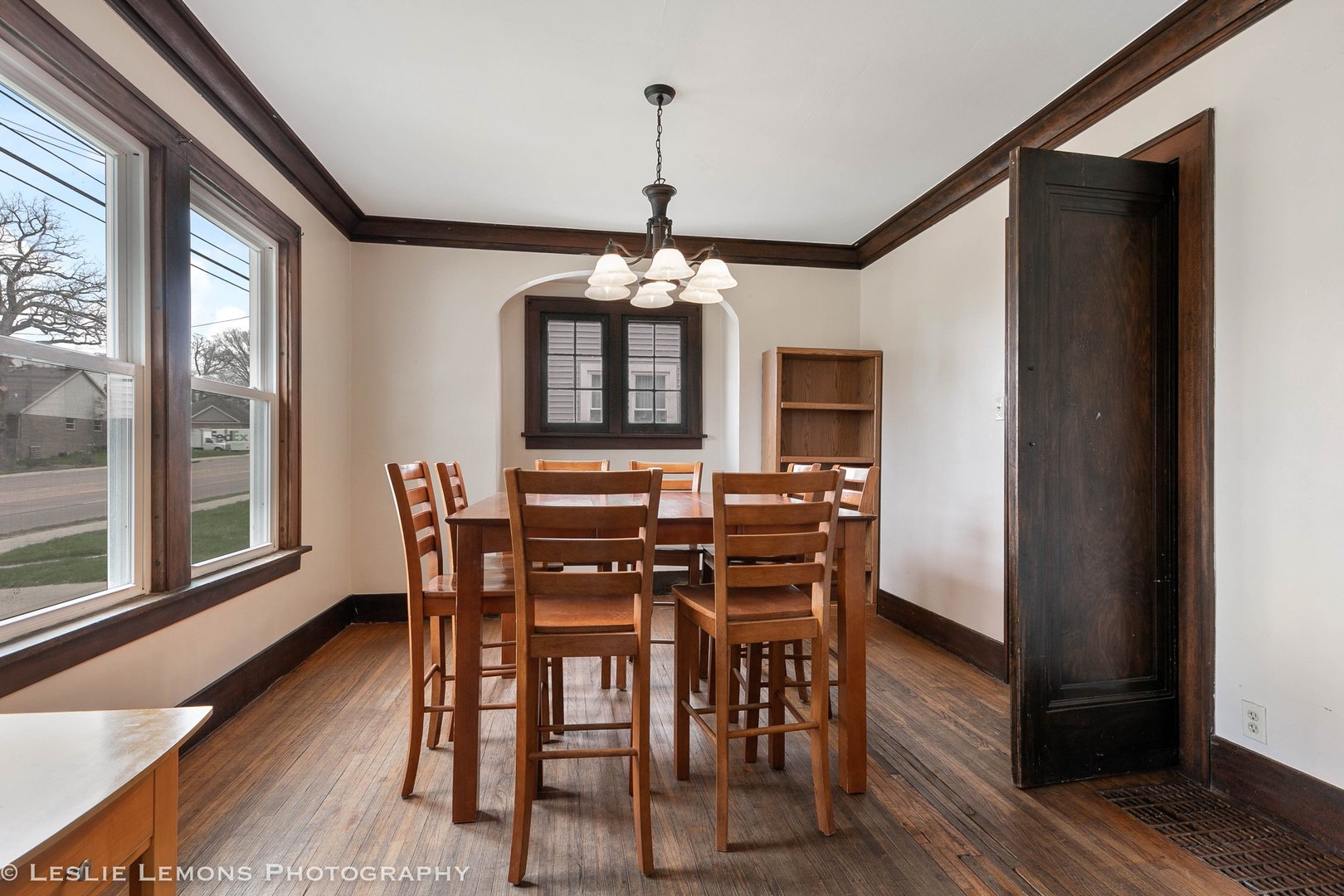 1106 Sycamore Road DeKalb, IL 60115 - Photo 5 of 30 a view of a dining room with furniture window and wooden floor