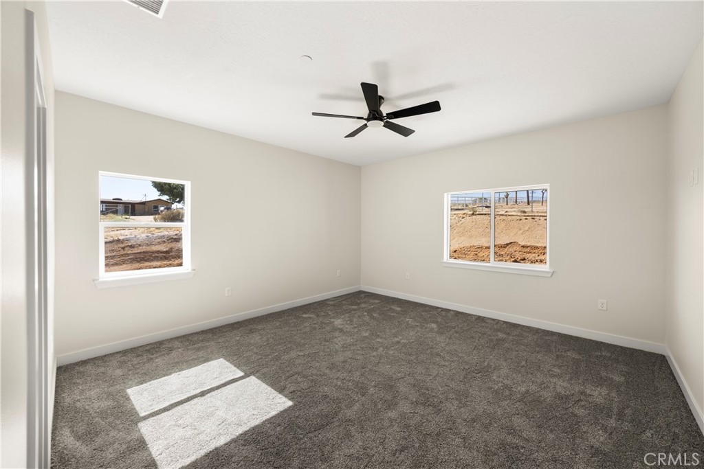 22324 Rancho Street Apple Valley, CA 92308 - Photo 23 of 47 a view of an empty room with a window