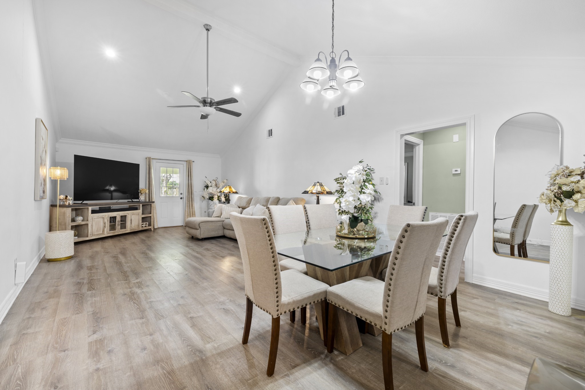 3823 Shadow Trail Houston, TX 77084 - Photo 8 of 29 a view of a dining room with furniture and wooden floor