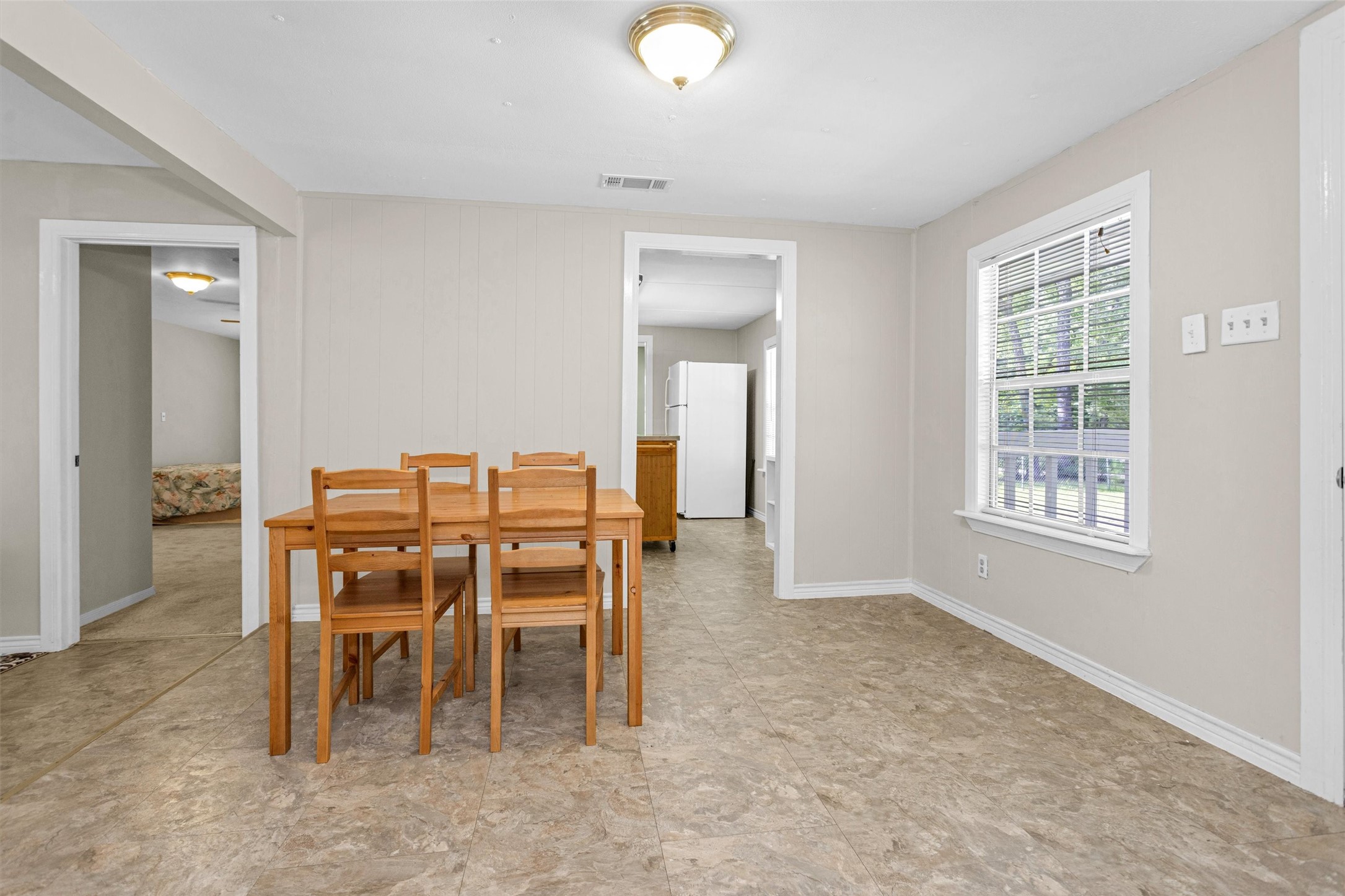 99 Main Street Huntsville, TX 77340 - Photo 10 of 47 Just off the dining room is the kitchen.