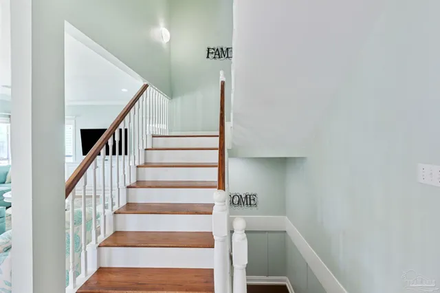 wooden floor with white walls