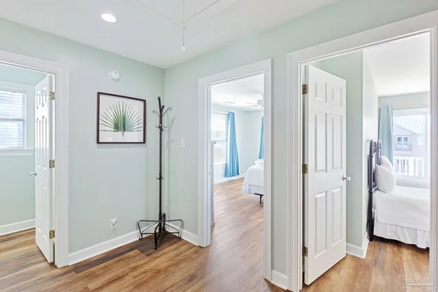 a front view of a building with a garden