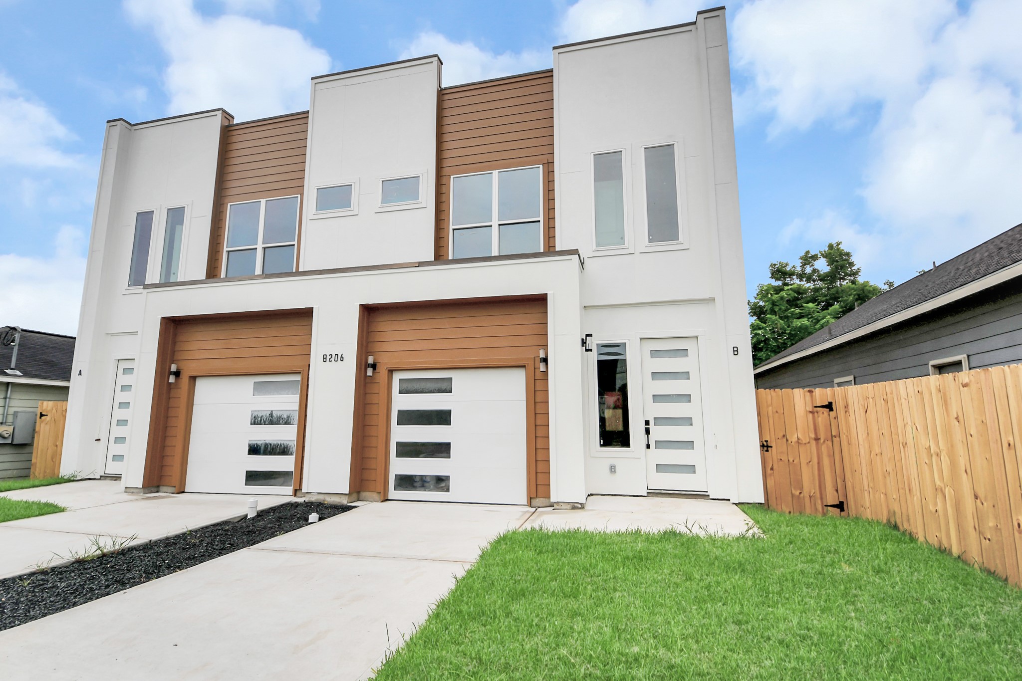 8206 Colonial Lane Houston, TX 77051 - Photo 4 of 31 front view of a house with a yard