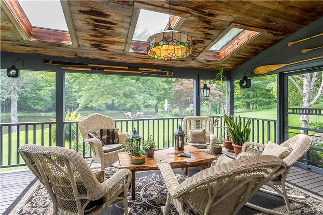 a balcony with wooden floor in outdoor space