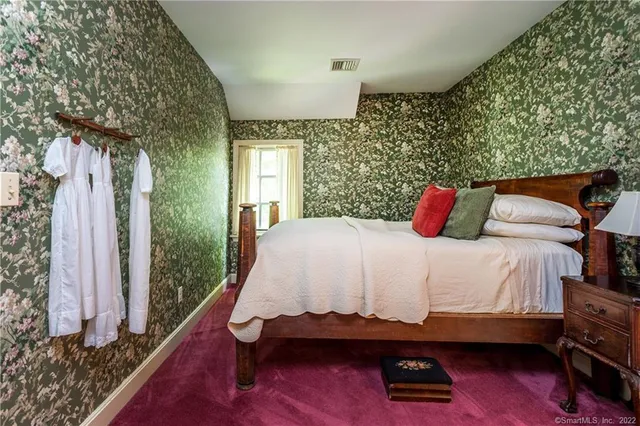 a view of a balcony with chairs