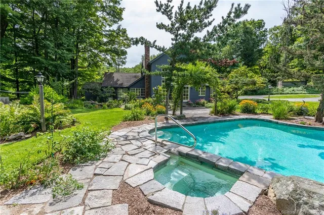 a view of a garden with a fountain