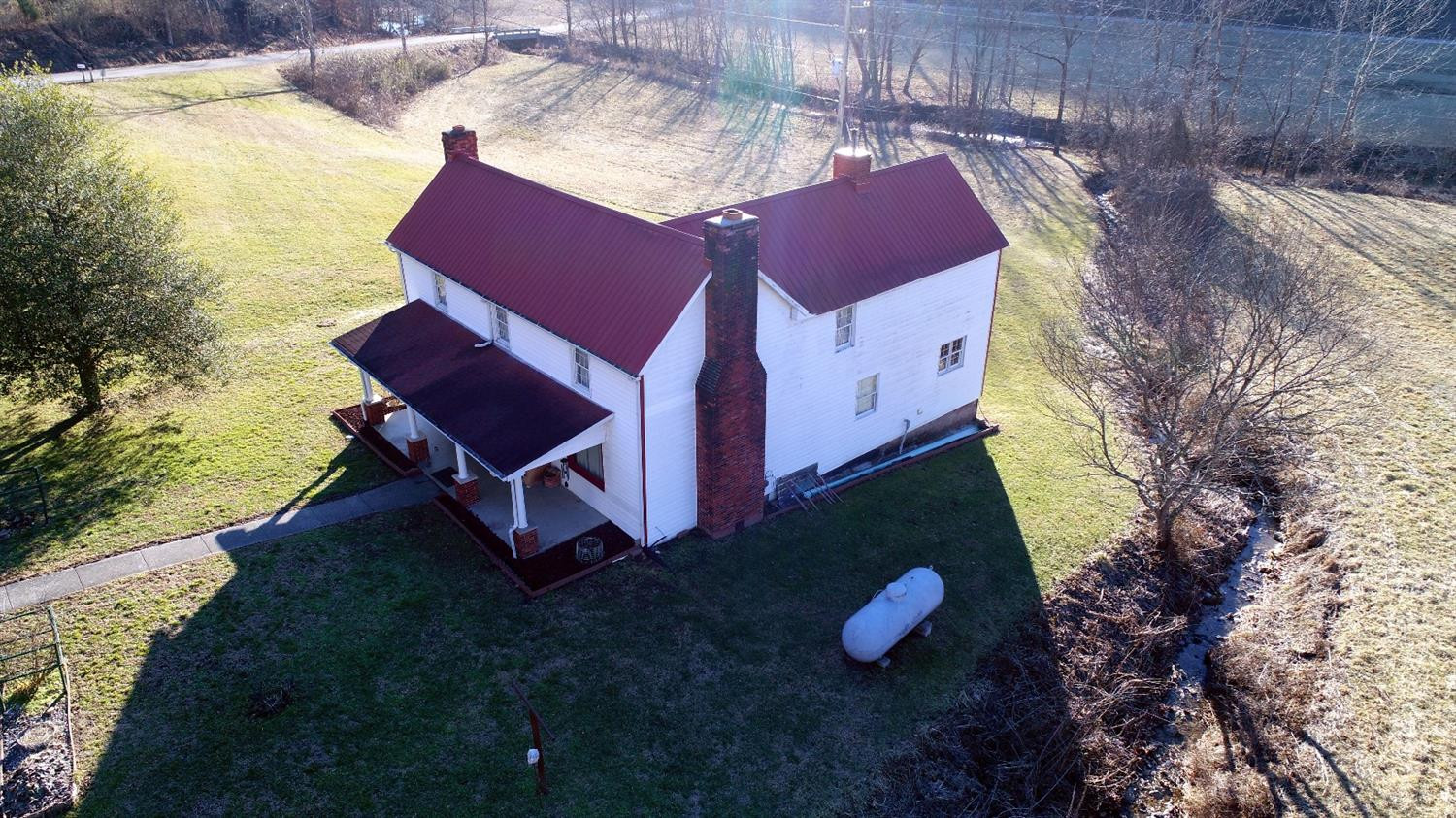 25 Morefield Road Ravenna, KY 40472 - Photo 2 of 60 Metal roof with three chimneys!