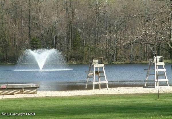 706 Fawn Road Pocono Lake, PA 18347 - Photo 10 of 17 a white tub sitting in the middle of a yard