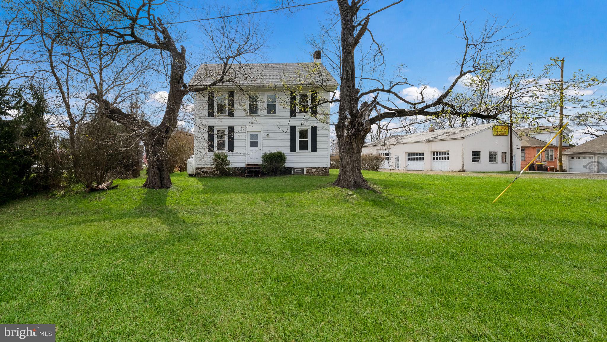 5182 Point Pleasant Pike Doylestown, PA 18902 - Photo 1 of 35 a view of a building with a yard