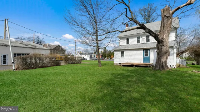 a view of a yard in front of a house