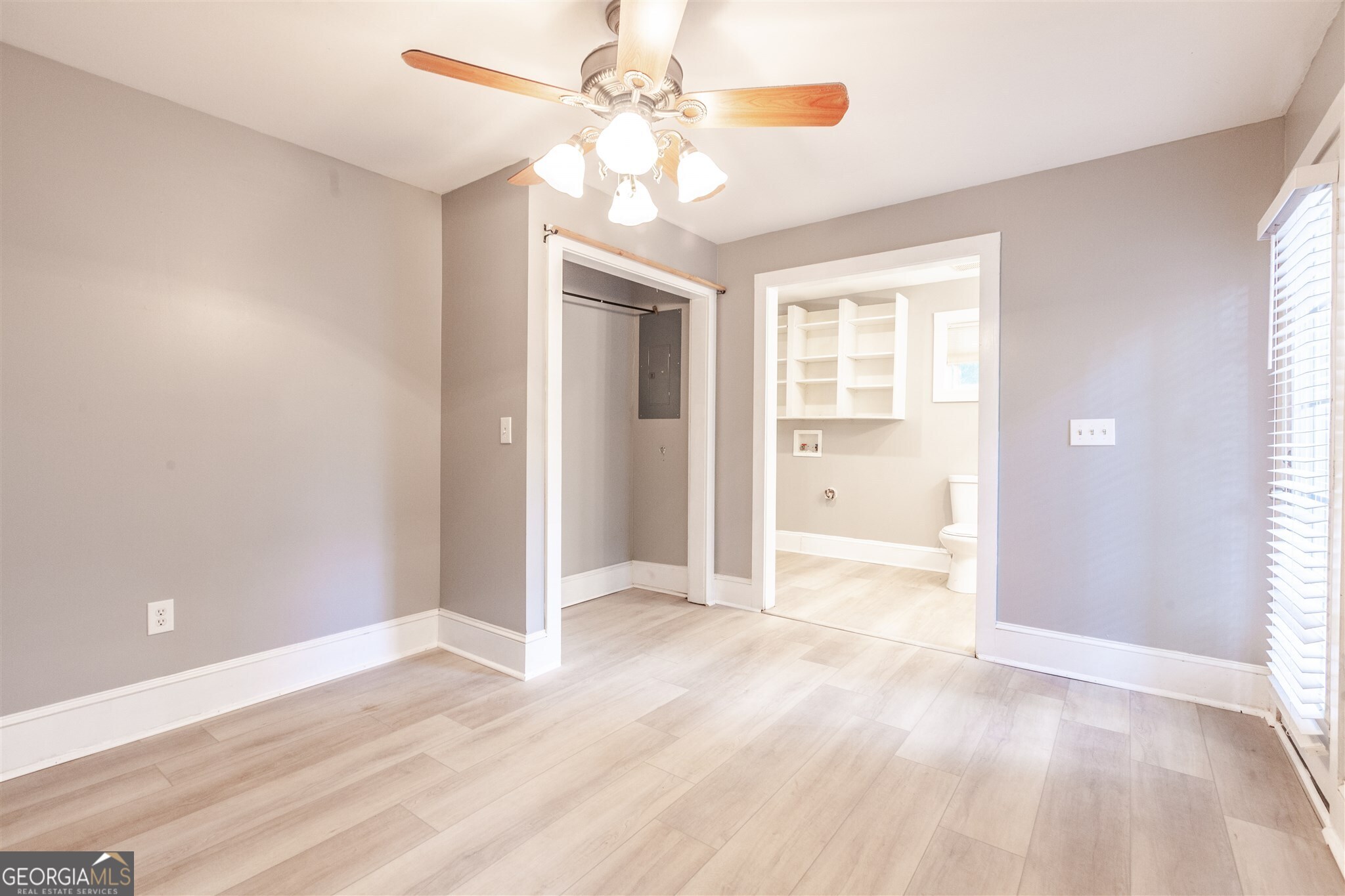 45 Bridge Street Senoia, GA 30276 - Photo 14 of 19 a view of an empty room with a window