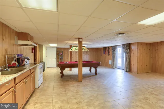 a lobby with furniture and window