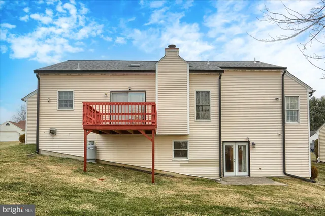 a picture of a bench in a white wall