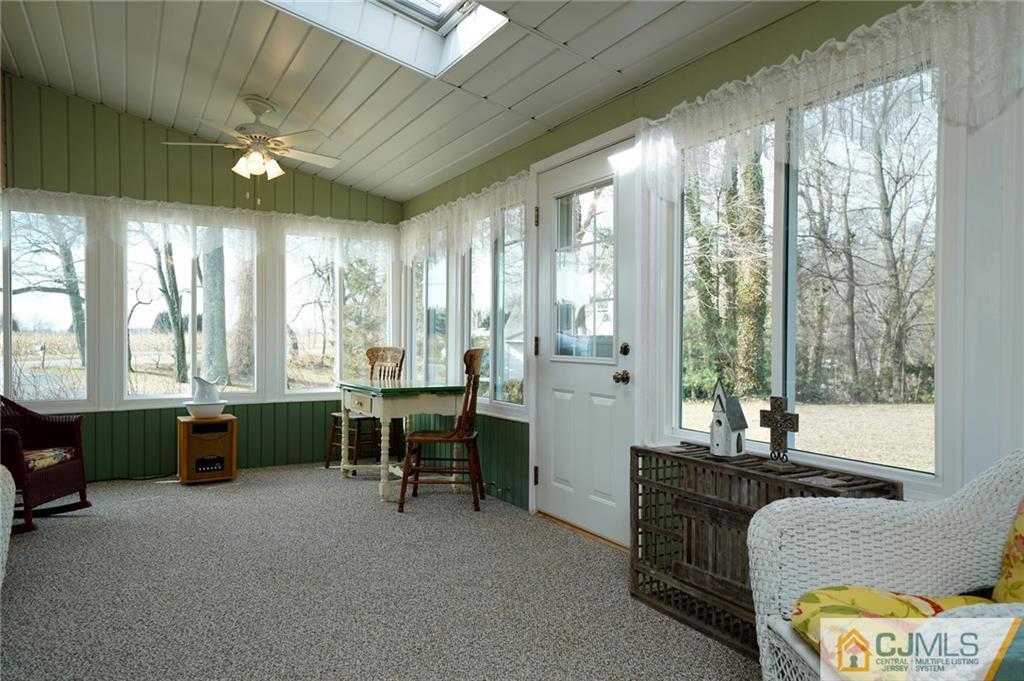 203 Crosswicks Ellisdale Road Chesterfield, NJ 08515 - Photo 10 of 25 a living room with furniture and a large window