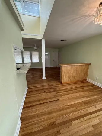 a kitchen with cabinets and appliances