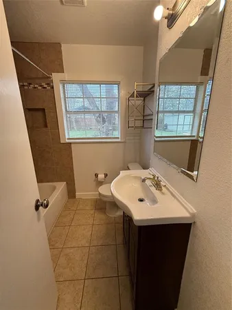 a bathroom with a sink and a bathtub