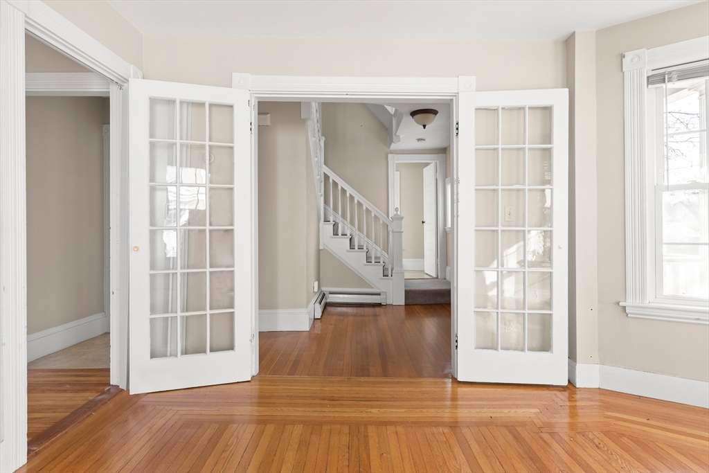 23 Proctor Street Salem, MA 01970 - Photo 15 of 41 a view of entryway and hall with wooden floor