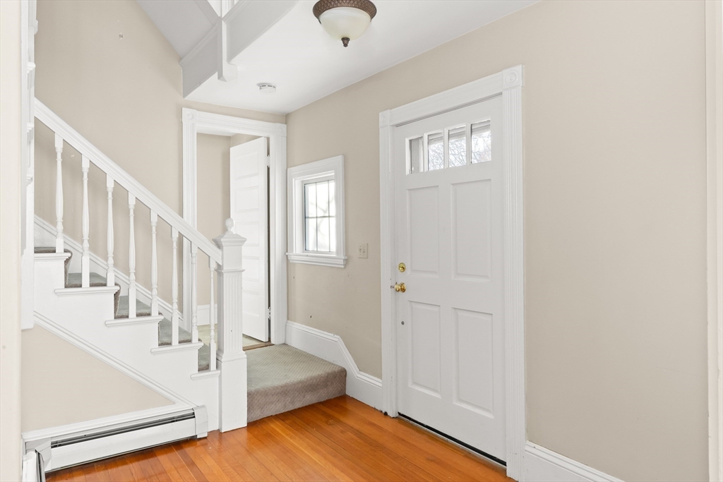 23 Proctor Street Salem, MA 01970 - Photo 16 of 41 a view of an entryway with wooden floor