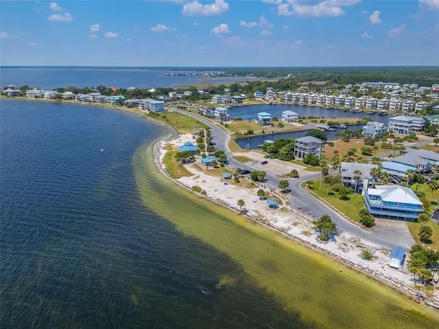 a view of an ocean and city