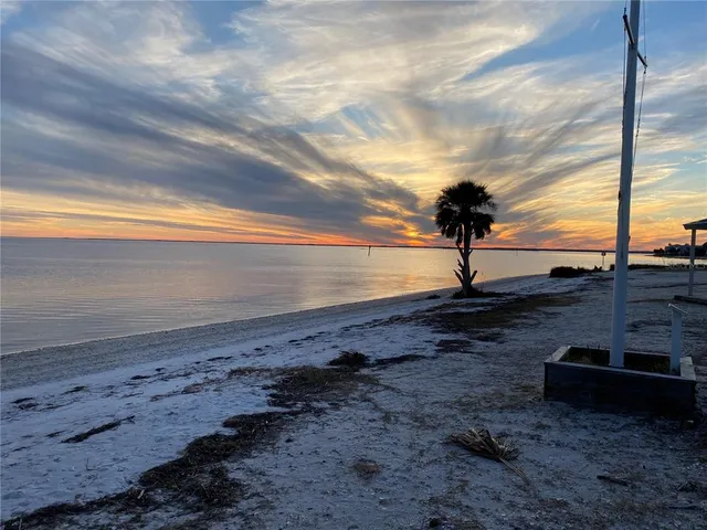 a view of a lake with outdoor space