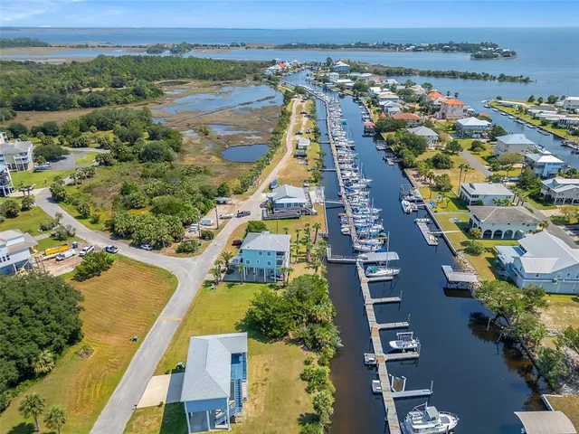 an aerial view of a city with lake view