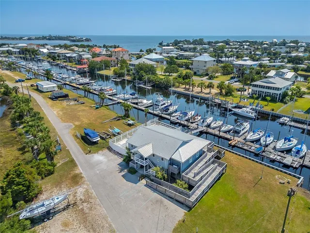 a view of a swimming pool with a table and chairs